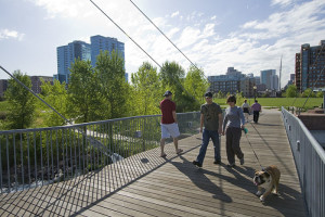 The Platte River Bridge, a pedestrian bridge over the South Platte River in Commons Park, is aligned with the Millennium Bridge and 16th Street in downtown Denver. This bridge, together with the Millennium Bridge and a third bridge over Interstate 25, has created a new and transformative nonvehicular commuting and recreational pathway within the city. (Armando Martinez)
